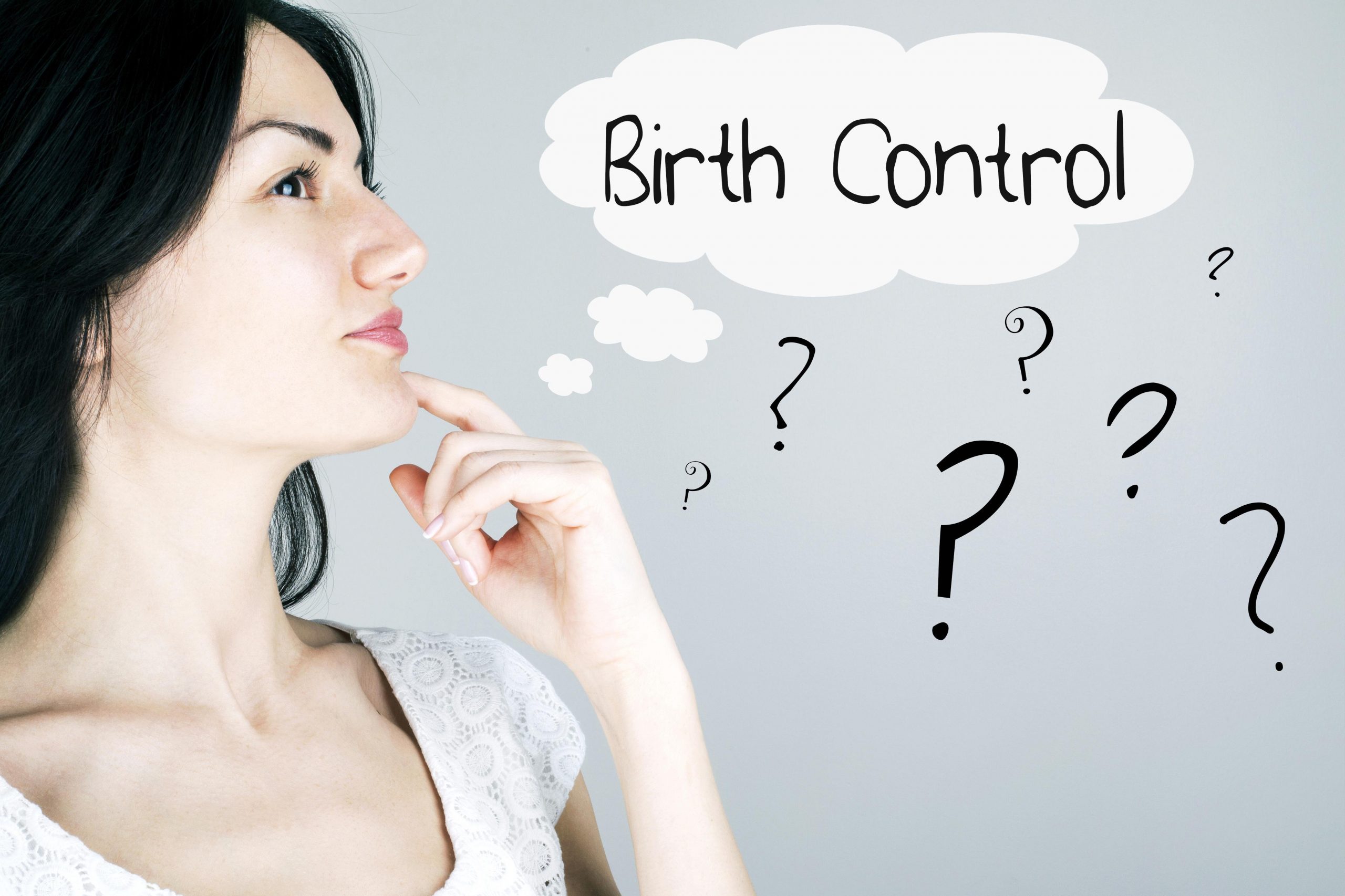 lady with finger on chin thinking about birth control